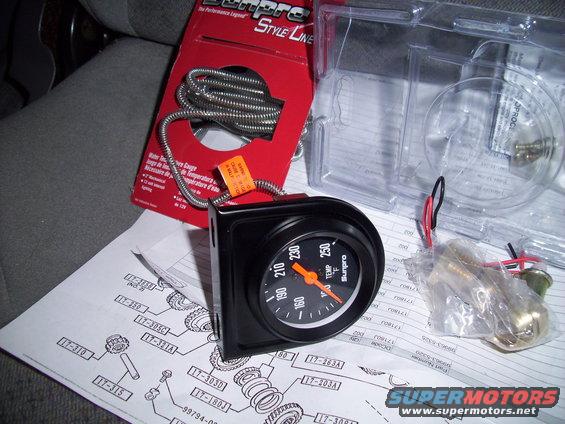 Black Sunpro water temperature gauge with orange needle