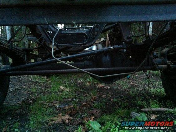 Undercarriage view of vehicle suspension and differential
