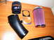 2004 Ford Crown Victoria - JLT Performance cold air intake kit includes a black intake tube, silicone coupler, and a red JLT high-flow air filter.
