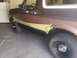 1992 Ford Bronco - Side view of a 1992 Ford Bronco with masking tape on the lower body panel.