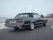 1991 Mercury Grand Marquis - Rear view of a black 1991 Mercury Grand Marquis sedan parked outdoors.