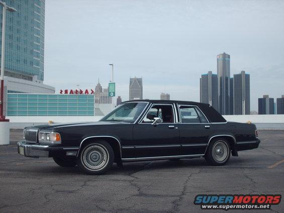 Black 1991 Mercury Grand Marquis sedan, side view
