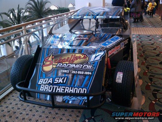 Modified race car with blue and black graphics, Schaeffer's Racing Oil logo, and number 17