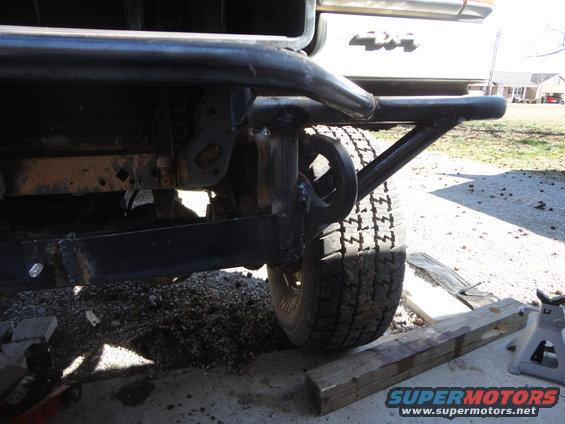 Custom front bumper with tow hook on a vehicle with '4x4' badging