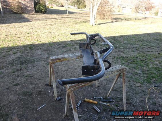 Custom front bumper with tow hooks on sawhorses