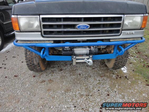 1990 Ford Bronco front bumper with blue tubing and winch