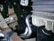 2004 Nissan Quest - Detail shot of interior mechanical components, including metal tubing and electrical connectors, with a SuperMotors watermark visible.
