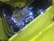 2003 Ford Crown Victoria - Customized engine bay with polished chrome and blue hoses, set against a bright yellow exterior.