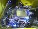 2003 Ford Crown Victoria - Customized engine bay chrome parts and a Ford emblem.