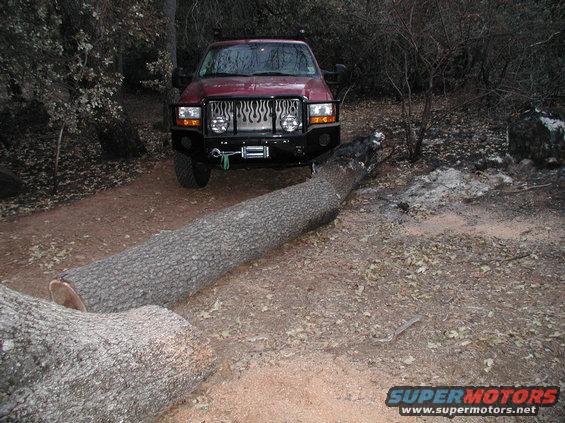 xclearingroad1.jpg Using new bumper as a bump stop while clearing a road in Julian, CA after the fires.