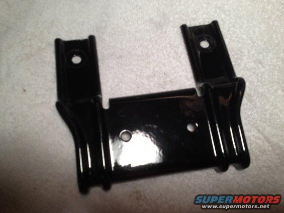 Black metal bracket with two mounting holes on top and one in the center