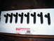 2004 Ford Crown Victoria - Eight fuel injectors are shown on a box that reads 'Ford Fuel Rails'.