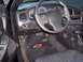 2002 Chevrolet Monte Carlo - Interior view of a 2002 Chevrolet Monte Carlo, showing the dashboard, steering wheel, and floor mats.