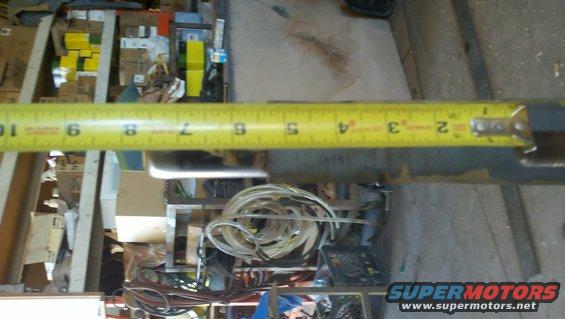 tape measure on metal tube in garage