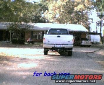 Rear view of a 2000 Ford F-150 pickup truck parked in a driveway