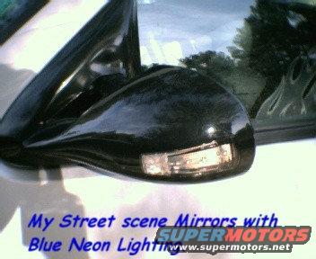 Side mirror with integrated turn signal and blue neon lighting