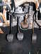 2004 Ford Crown Victoria - Close-up view of the driver's side foot pedals and steering column assembly.