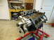 1979 Ford F-150 - An engine block is shown on a stand in a garage, with a timing dial attached.