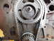 1979 Ford F-150 - Close-up view of an engine's timing chain and gears, showing part number D9TE-8A and date stamp 03 16 2013.