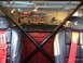 1996 Ford F-150 - Custom roll cage and racing seats installed in a truck's interior.