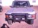 1991 Land Rover Range Rover - Front view of a silver 1991 Land Rover Range Rover, equipped with a protective bull bar.