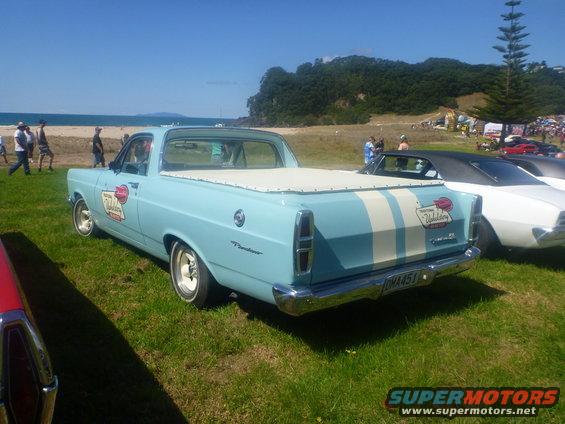 Light blue 1969 Ford Falcon Ranchero with white stripes and 'Wellington' decal