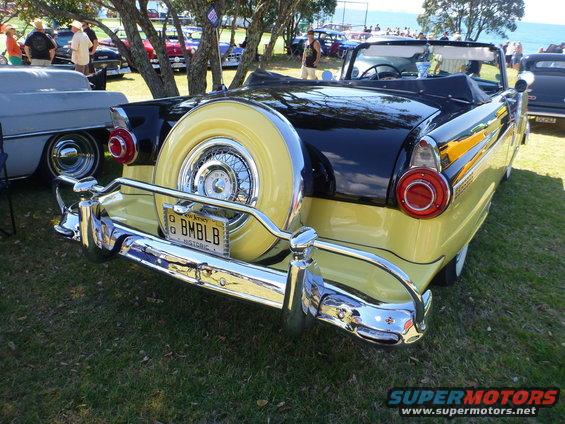1956 Ford Fairlane Crown Victoria convertible, yellow and black, with continental kit and spare tire. New Jersey license plate BMLBL