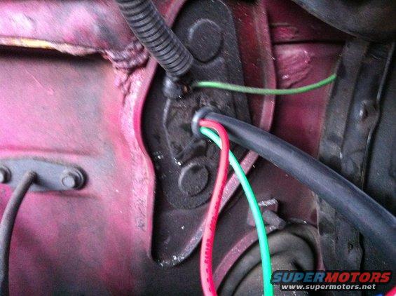 img_0672.jpg Here is where I ran the vacuum line through the firewall. It was perfect for the line and the wires for the temp sender of the overhead console.
