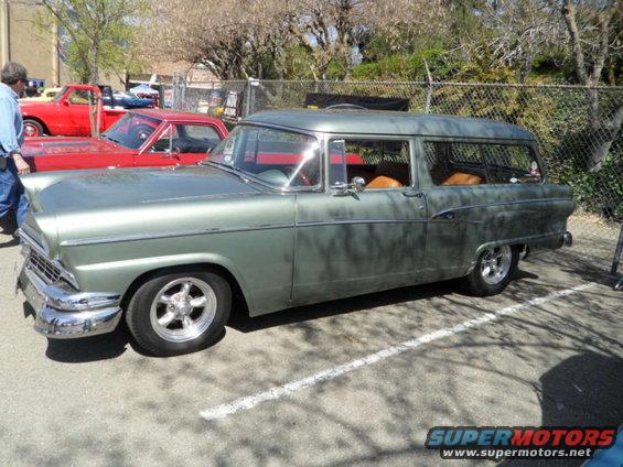 Green 1956 station wagon, side view, custom wheels