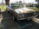 1973 Ford Ranchero - Front view of a 1970 Ford Ranchero with a distinctive grille, parked in a handicapped space.