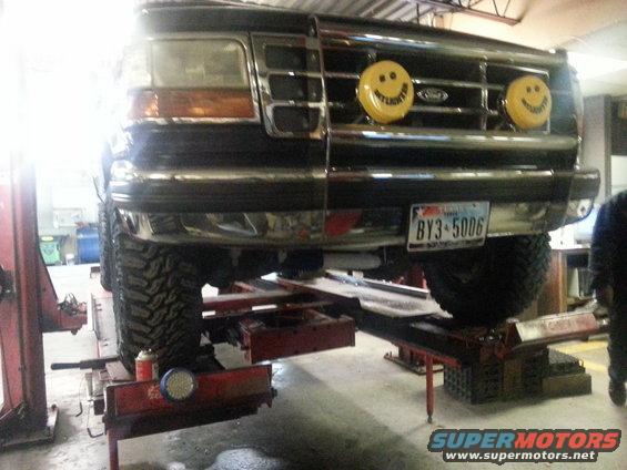 1995 Ford Bronco front view with smiley face lights and custom license plate BY3-5006