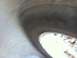 1996 Ford Bronco - The image shows a portion of a vehicle's wheel well and tire, with a watermark from Supermotors.net.