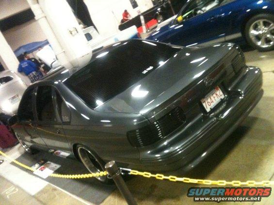 Dark sedan with tinted windows and a license plate reading 764FK2