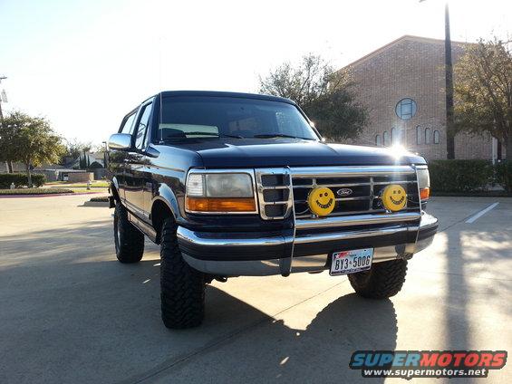 1995 Ford Bronco front view with custom grille and smiley face fog lights