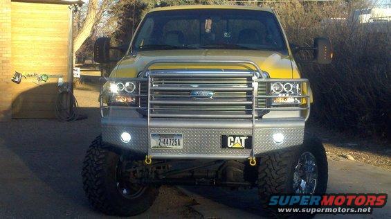 amarill-121.jpg EAGLE EYE PROJECTION HEADLIGHTS WITH HALO RINGS, HOMEMADE FRONT BUMPER WITH 2 18 WATT LED FLOOD LIGHTS.