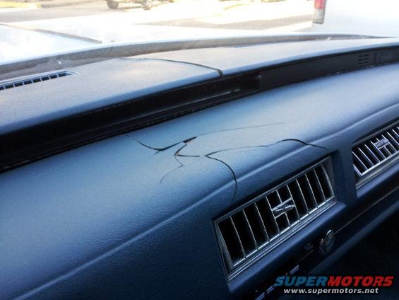 Cracked dashboard with air vents visible