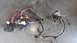 1973 Chevrolet Camaro - A complex wiring harness with multiple colored wires and connectors is laid out on a concrete floor.