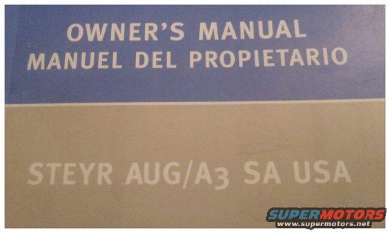Owner's manual cover with text 'OWNER'S MANUAL MANUEL DEL PROPIETARIO STEYR AUG/A3 SA USA' and 'SUPERMOTORS.NET' logo