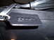 1993 Ford Probe - Close-up of a black leather handbag tag showing the embossed COACH logo.
