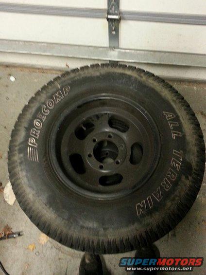 Black all-terrain tire with "PRO COMP" and "ALL TERRAIN" text