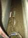 1992 Ford C-350 (Centurion Conversions) - Close-up of accumulated dirt and debris within a vehicle's structural components.