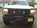 1992 Ford C-350 (Centurion Conversions) - This 1992 Ford C-350 Centurion Conversions features a front brush guard and winch, ready for any terrain.