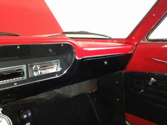 1964 Ford Fairlane interior dashboard with red and black trim, Pioneer radio, and chrome accents