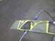 2003 Ford Crown Victoria - A car grille and headlight assembly is covered with masking tape and a protective sheet.