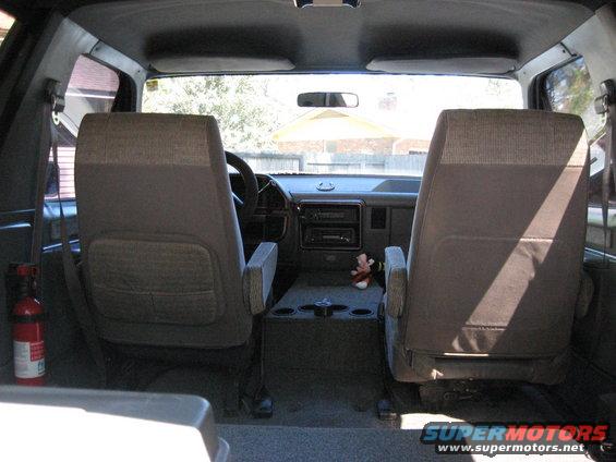 1988 Ford Bronco interior showing front seats, dashboard, and center console