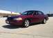 2005 Ford Crown Victoria - This 2005 Ford Crown Victoria is seen from a three-quarter front view in a parking lot.