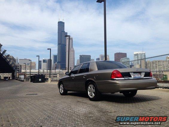 2005 Ford Crown Victoria parked with Chicago skyline in background