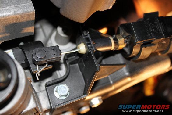 6w1z-3f719-a mounted in place with the retainer pin, very important, pin must be used.