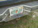 1992 Ford Bronco - Rear bumper detail of a vehicle with a Florida license plate.