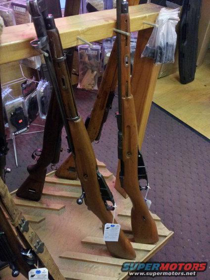 Rifles on display in a store